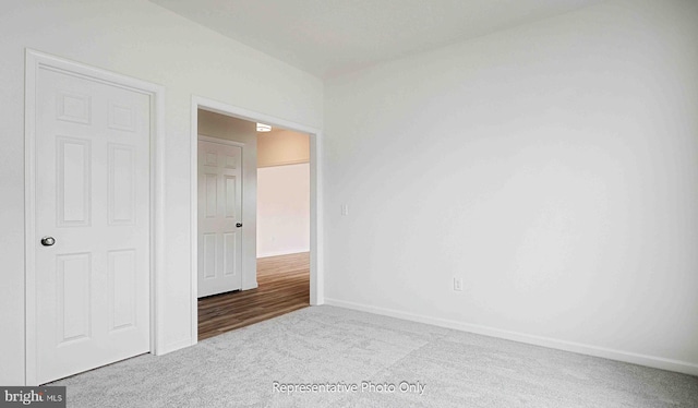 unfurnished bedroom featuring carpet floors