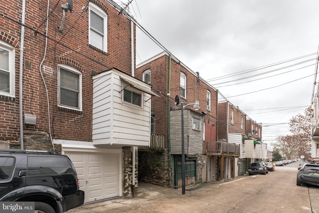 view of building exterior with a garage