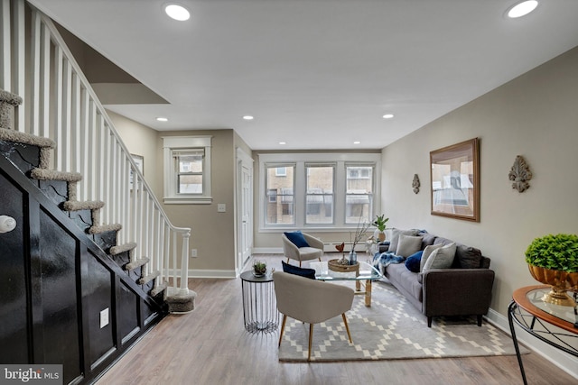 living room featuring light hardwood / wood-style floors and baseboard heating