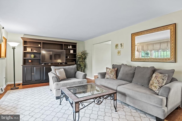 living room with hardwood / wood-style flooring