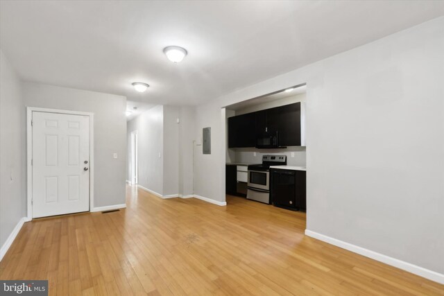 unfurnished living room featuring light wood-type flooring