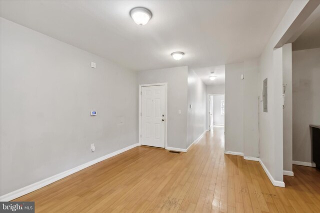 unfurnished room featuring light hardwood / wood-style floors