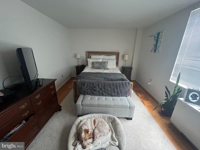 bedroom featuring light hardwood / wood-style floors