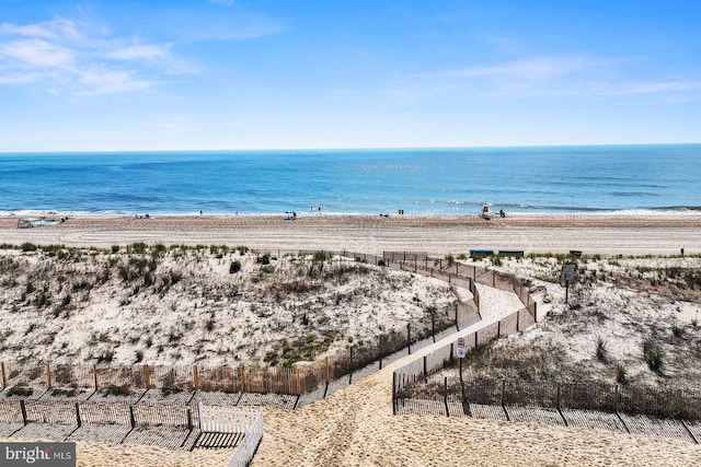 view of water feature with a beach view