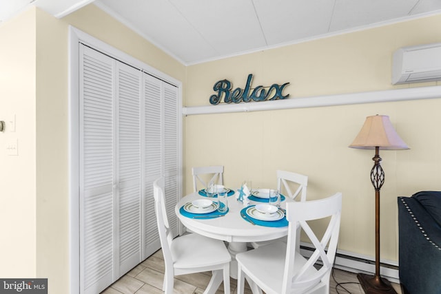 dining area featuring light wood-type flooring, ornamental molding, and a wall mounted AC