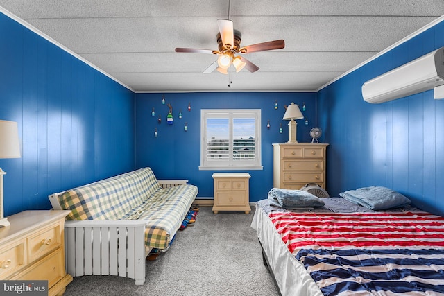 bedroom featuring wooden walls, a wall unit AC, ceiling fan, and carpet floors