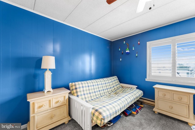 bedroom featuring carpet, ceiling fan, and baseboard heating