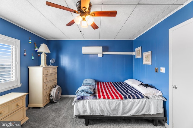 bedroom with a wall unit AC, dark colored carpet, and ceiling fan