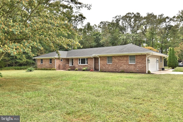 ranch-style house with a front lawn and a garage