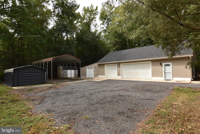 garage with a carport