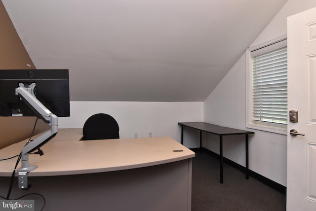 home office featuring vaulted ceiling