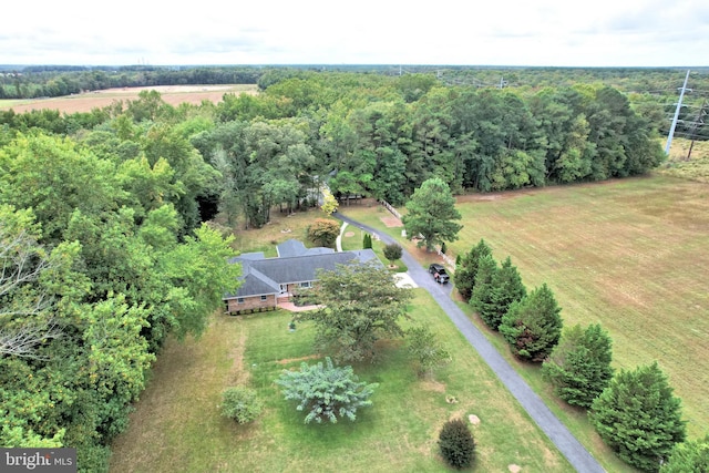 birds eye view of property with a rural view