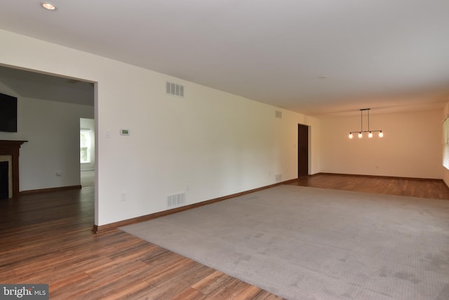 empty room with dark wood-type flooring