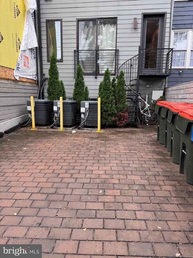 view of patio / terrace with central AC unit