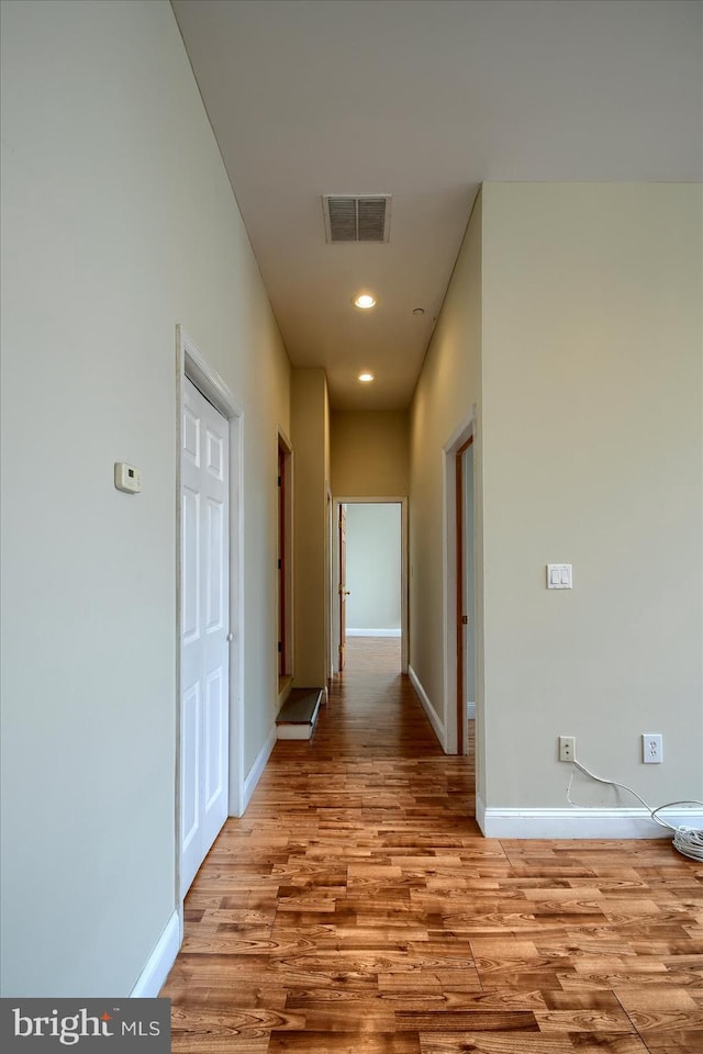 corridor featuring light wood-type flooring