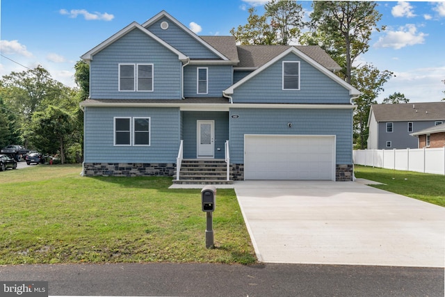 craftsman-style house with a garage and a front yard