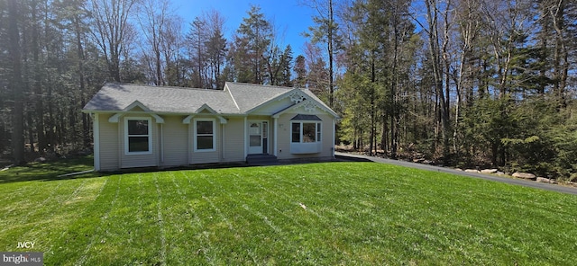 view of front of property with a front yard