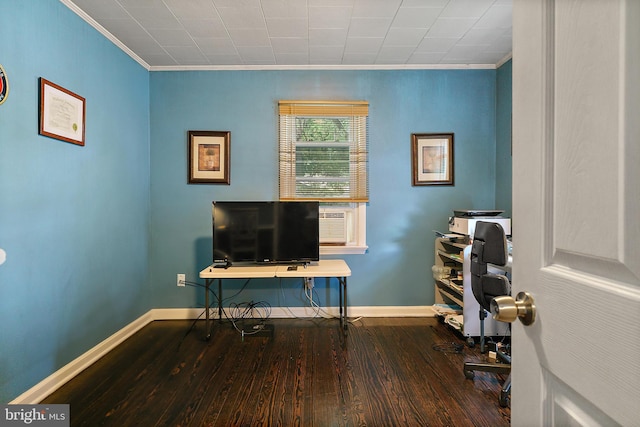 office space featuring baseboards, wood finished floors, and crown molding