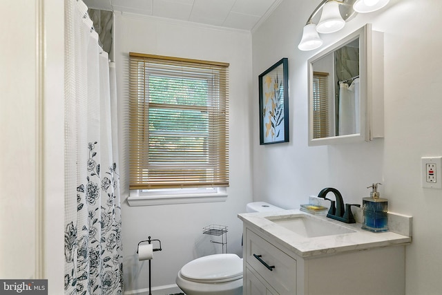 full bathroom with a shower with curtain, toilet, vanity, and ornamental molding