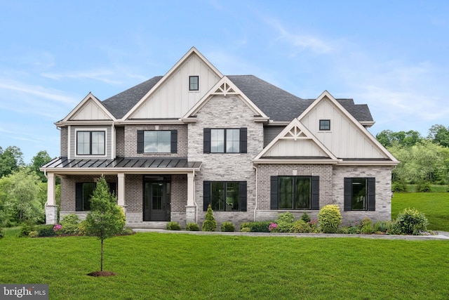 craftsman-style house with a front yard