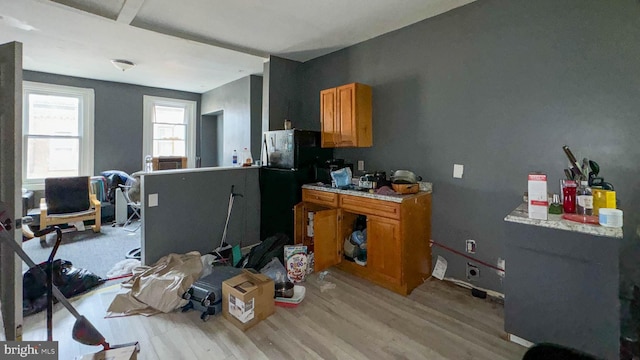 office space featuring light wood-type flooring