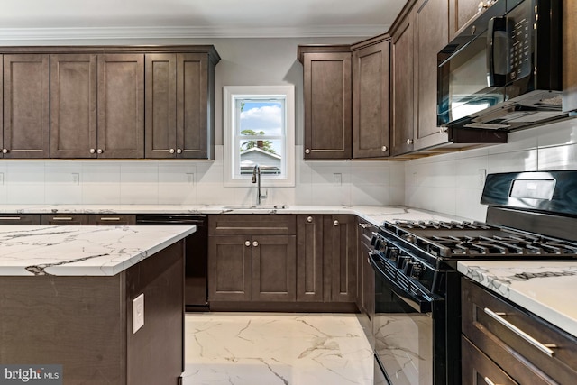 kitchen with light stone counters, black appliances, dark brown cabinets, ornamental molding, and sink