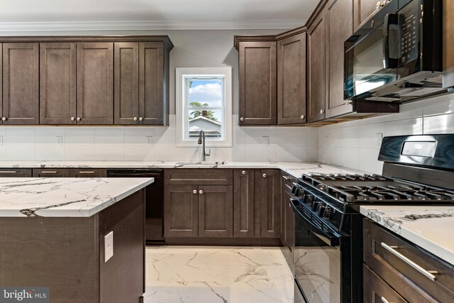 1406 Circle Dr, Forked River, NJ 08731 - kitchen with a sink, dark brown cabinets, black appliances, and marble finish floor