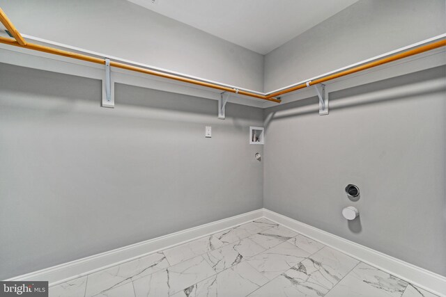 1406 Circle Dr, Forked River, NJ 08731 - laundry area with laundry area, hookup for a gas dryer, marble finish floor, and baseboards