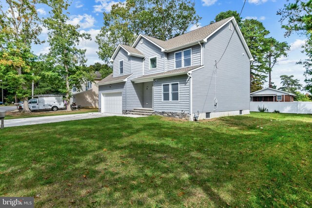 1406 Circle Dr, Forked River, NJ 08731 - view of front of house featuring concrete driveway, an attached garage, a front lawn, fence, and a shingled roof