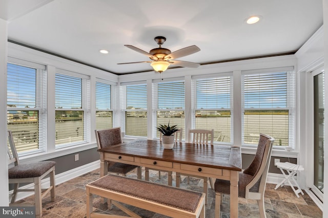 dining room featuring ceiling fan