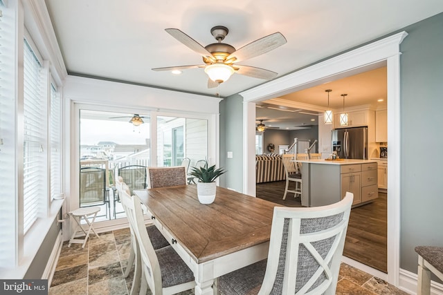 dining space featuring dark hardwood / wood-style floors