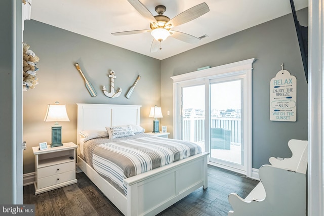 bedroom featuring access to outside, dark hardwood / wood-style floors, and ceiling fan