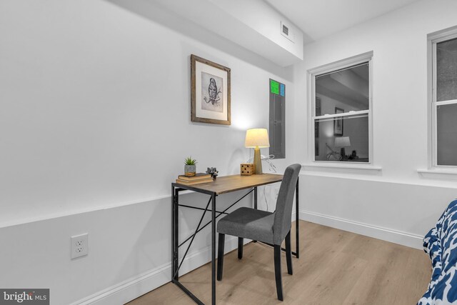 home office featuring light hardwood / wood-style flooring