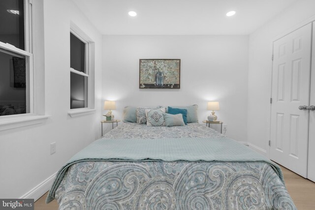 bedroom featuring light wood-type flooring