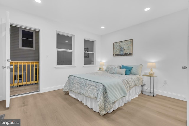 bedroom with light wood-type flooring