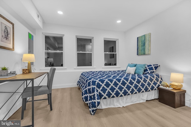 bedroom featuring wood-type flooring