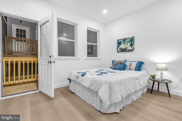 bedroom with light hardwood / wood-style flooring