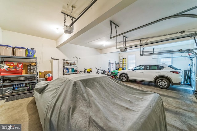 garage featuring a garage door opener