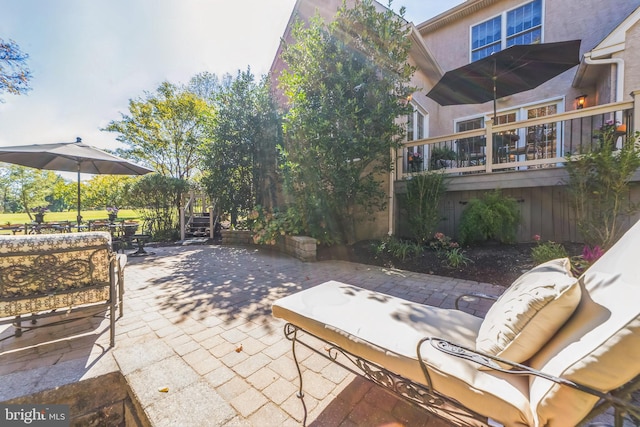 view of patio / terrace with outdoor lounge area and a deck