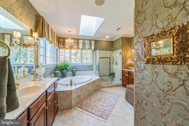 bathroom with separate shower and tub, ornamental molding, an inviting chandelier, vanity, and a skylight