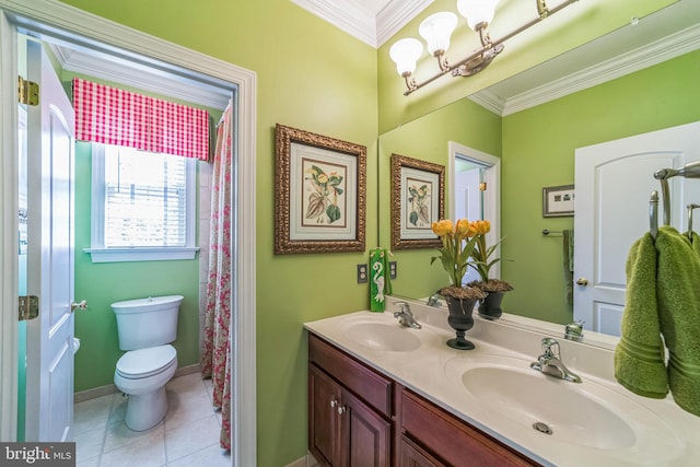 bathroom featuring toilet, ornamental molding, vanity, and tile patterned floors