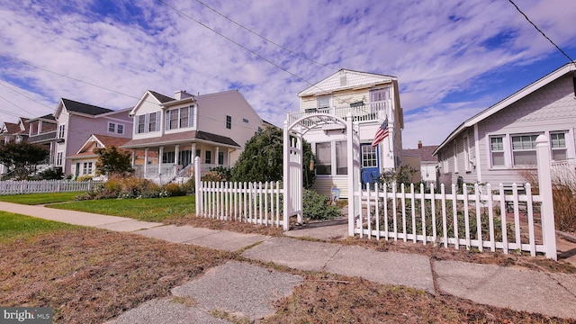 view of front property with a balcony