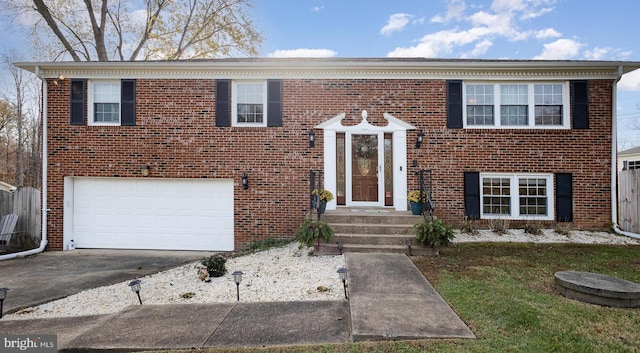 bi-level home featuring a garage