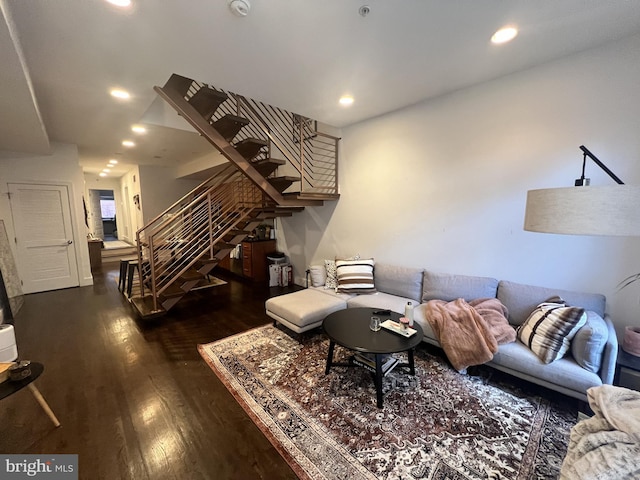 living room featuring dark hardwood / wood-style floors