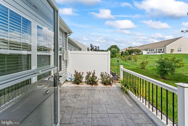 view of patio with a balcony