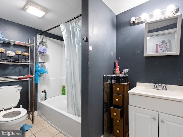 full bathroom featuring vanity, toilet, tile patterned floors, and shower / tub combo with curtain