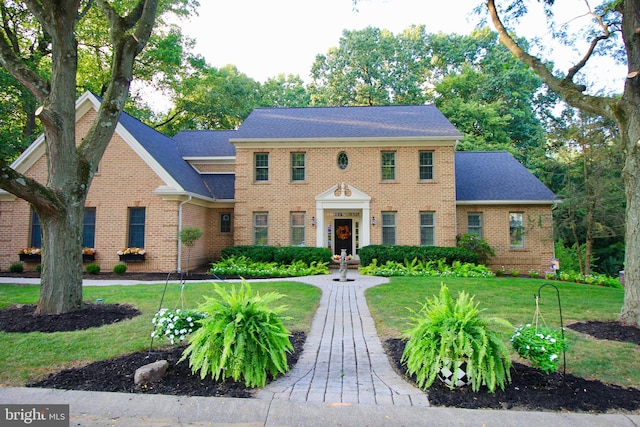 view of front of property with a front lawn