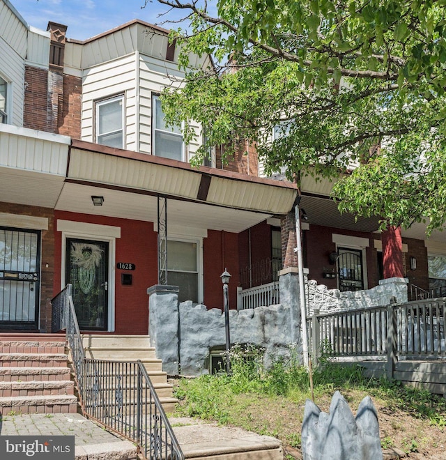 multi unit property featuring covered porch