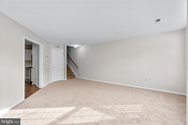 basement featuring carpet flooring