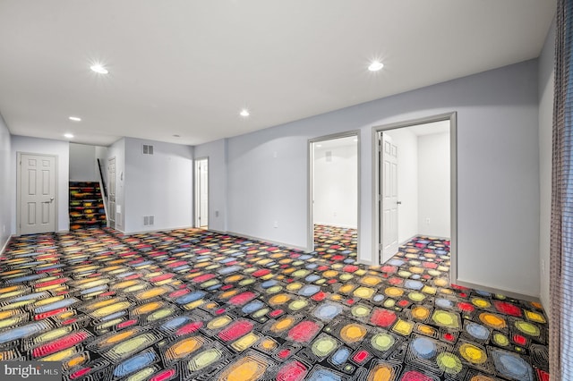 basement featuring carpet flooring